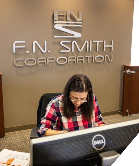 A receptionist working at F.N. Smith.
