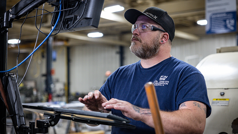 An engineer that is using equipment from F.N. Smith.